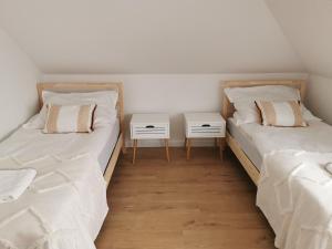 Postel nebo postele na pokoji v ubytování Hygge House
