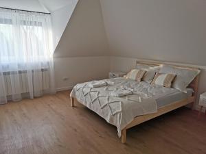 Postel nebo postele na pokoji v ubytování Hygge House
