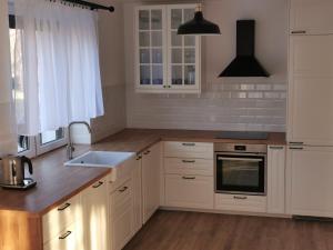 Kuchyň nebo kuchyňský kout v ubytování Hygge House