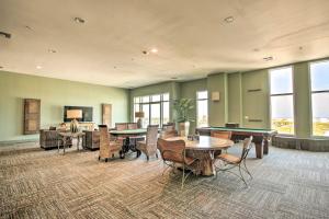 a large room with tables and ping pong balls at Beachfront Condo with Pool in Galveston! in Galveston +48 photos