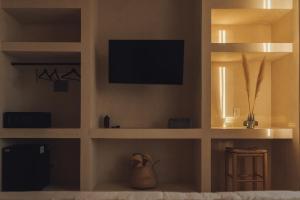 TV a/nebo společenská místnost v ubytování Casa Peregrino Holbox