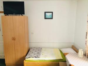 Posteľ alebo postele v izbe v ubytovaní U Sobali