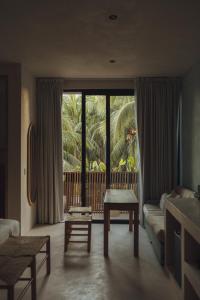 Postel nebo postele na pokoji v ubytování Casa Peregrino Holbox + 37 fotografií