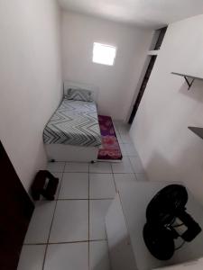 Postel nebo postele na pokoji v ubytování Ap08-A 50 Metros da Praia Flats Mobiliados para 4 Pessoas + 9 fotografií