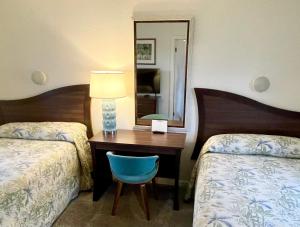 Voodi või voodid majutusasutuse Surf Studio Beach Resort toas