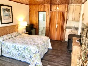 Voodi või voodid majutusasutuse Surf Studio Beach Resort toas