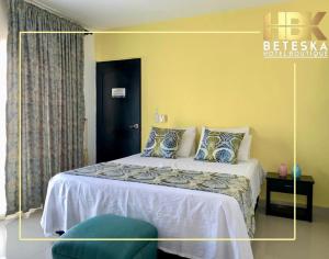 A bed or beds in a room at Hotel Boutique Beteska