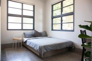 Voodi või voodid majutusasutuse Little Garden Dream Life Home toas