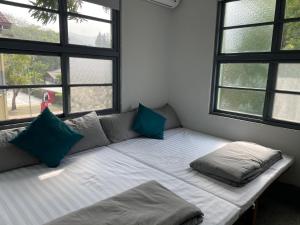 Voodi või voodid majutusasutuse Little Garden Dream Life Home toas
