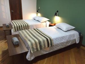 Letto o letti in una camera di Ñañas Hostel