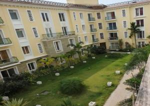 Κήπος έξω από το Areia De Goa - SunLight By Leela Homes