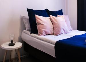 Posteľ alebo postele v izbe v ubytovaní EURO-ROOM