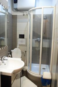 Kúpeľňa v ubytovaní EURO-ROOM