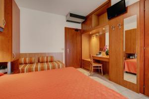 TV a/nebo společenská místnost v ubytování Hotel Jalisco