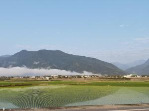 Chin-yüanにある花總管のエアモットを背景にした山原