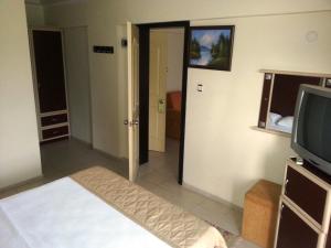 TV a/nebo společenská místnost v ubytování Hamle Hotel