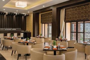 Restoran atau tempat lain untuk makan di Ramada Encore by Wyndham Statue of Unity