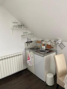 Cuina o zona de cuina de Apartman Toki