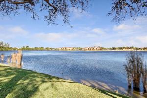 a view of a lake with houses in the distance at La Quinta by Wyndham Ft. Lauderdale Airport in Hollywood