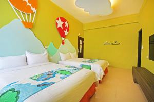 Uma cama ou camas num quarto em Fun Trip - Little Castle & Oscar B&B
