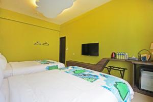 Uma cama ou camas num quarto em Fun Trip - Little Castle & Oscar B&B