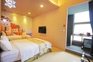 Uma cama ou camas num quarto em Fun Trip - Little Castle & Oscar B&B
