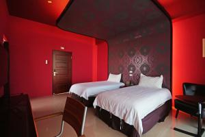 Uma cama ou camas num quarto em Fun Trip - Little Castle & Oscar B&B