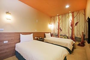 Uma cama ou camas num quarto em Fun Trip - Little Castle & Oscar B&B