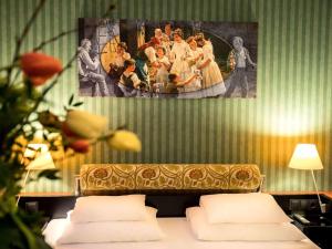 Postel nebo postele na pokoji v ubytování Mercure Grand Hotel Biedermeier Wien