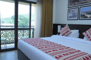 Katil atau katil-katil dalam bilik di Ramada Encore by Wyndham Statue of Unity