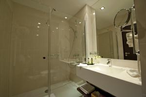 Koupelna v ubytování Abacus Business & Wellness Hotel