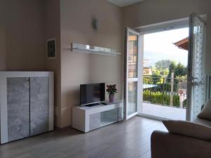 TV a/nebo společenská místnost v ubytování Danilo Apartments