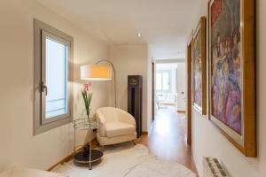 Posteľ alebo postele v izbe v ubytovaní BizFlats Eixample Apartments