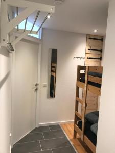 a room with a bunk bed and a window at Appartement Familie Willems Winterberg Am Waltenberg in Winterberg +40 photos