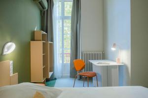 Postel nebo postele na pokoji v ubytování Hôtel IMPERATOR Béziers