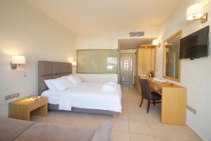 Postel nebo postele na pokoji v ubytování Ionian Emerald Resort