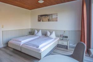 Postel nebo postele na pokoji v ubytování K 357 - Low budget Hotel in Ratekau bei Lübeck
