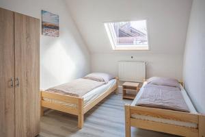 Postel nebo postele na pokoji v ubytování K 357 - Low budget Hotel in Ratekau bei Lübeck