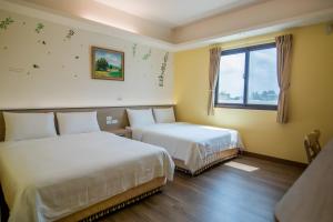 Postel nebo postele na pokoji v ubytování MuXia Fengqing Homestay