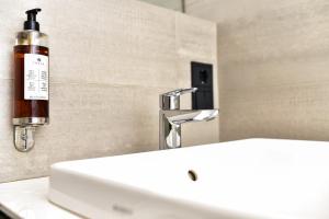 Koupelna v ubytování New Gudauri,Redco Block 4-Apt 202 + 4 fotografie