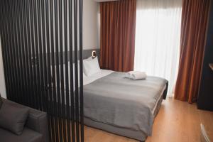 Postel nebo postele na pokoji v ubytování New Gudauri,Redco Block 4-Apt 202