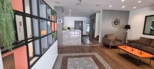 a living room with a couch and a table at Residencial & Hotel Palazzo in Panama City