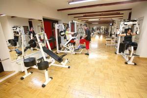 The fitness centre and/or fitness facilities at Hotel Dinara