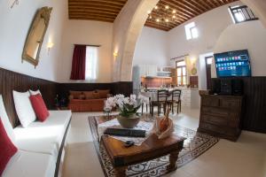 A television and/or entertainment centre at Villa Amalia