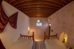 A bed or beds in a room at Villa Amalia