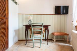 Telewizja i/lub zestaw kina domowego w obiekcie Hotel D´Interior Ca Mado Paula