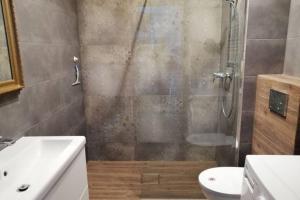 Koupelna v ubytování Komfortowy apartament dla turystów i pracowników