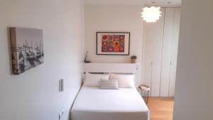 Posteľ alebo postele v izbe v ubytovaní SEAFRONT LUXURY STUDIO - by www,SanSebastianApartments,es