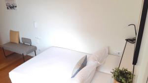 Posteľ alebo postele v izbe v ubytovaní SEAFRONT LUXURY STUDIO - by www,SanSebastianApartments,es