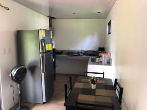 A kitchen or kitchenette at Pet Friendly - WFH Beach House